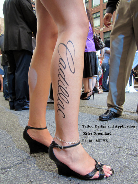 Tattoo Design and Application : Krisz Drouillard  Photo : MLIVE